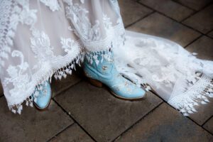 Do cowboy boots look cute with a wedding dress?